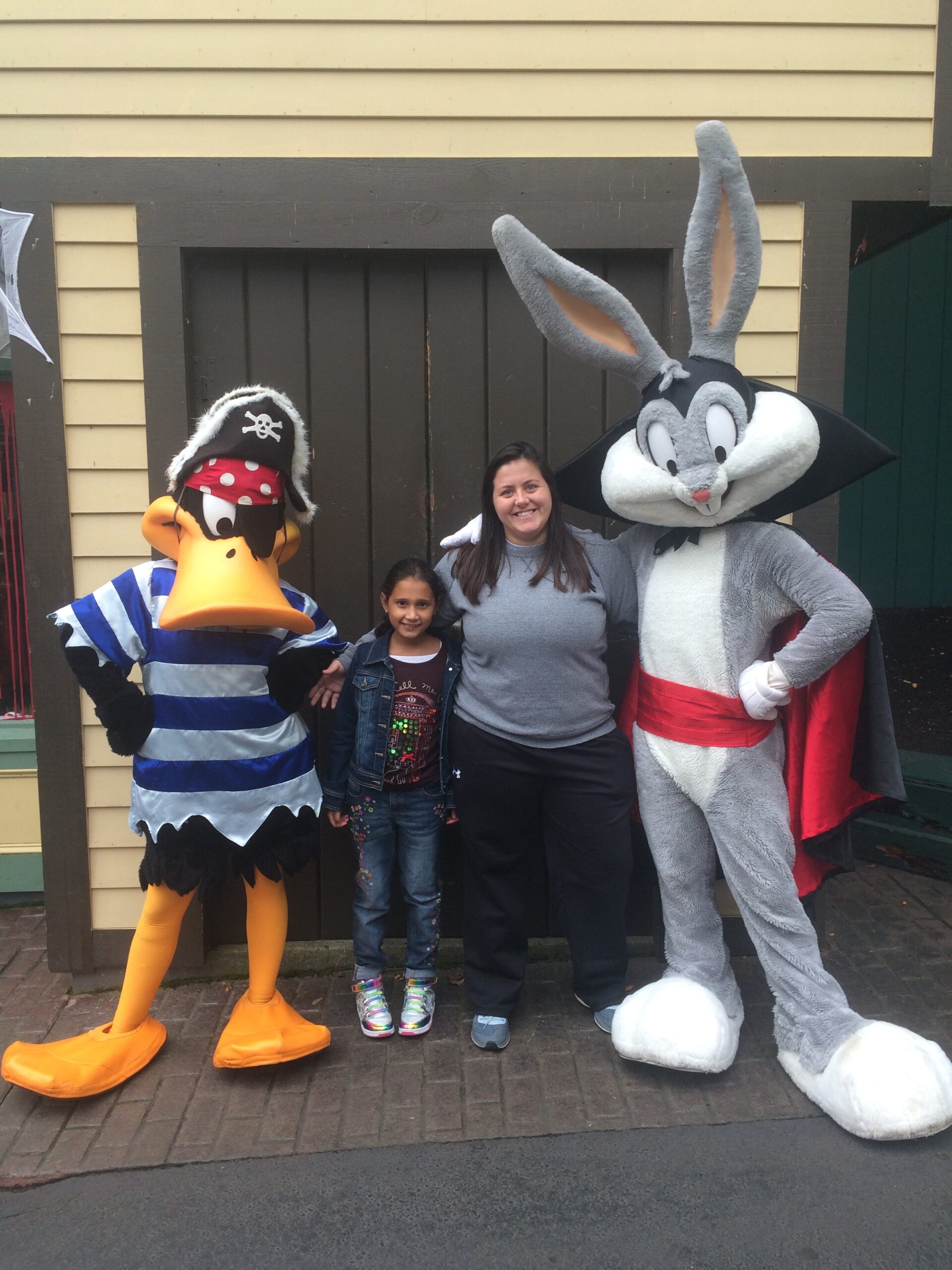 Big Sister with Little Sister, posing with Daffy Duck and Bugs Bunny
